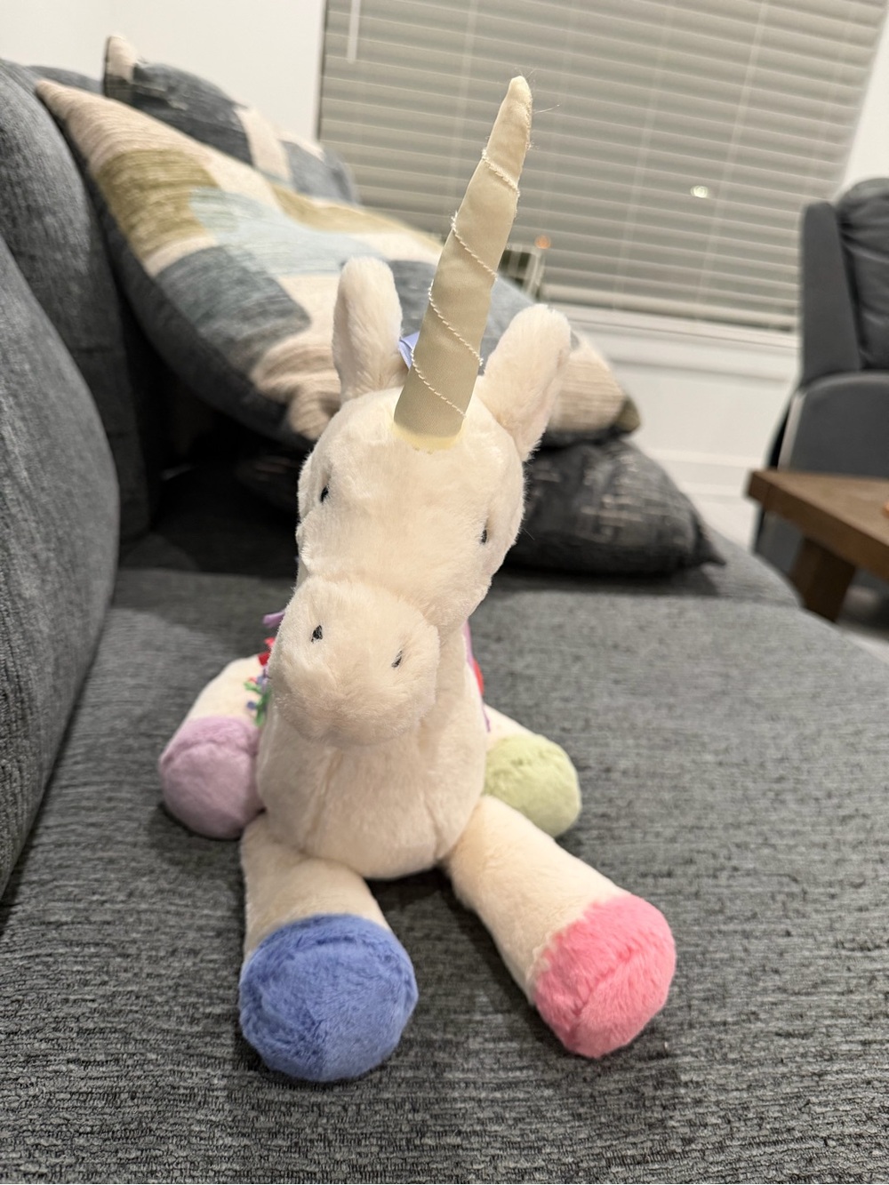 Jellycat Cream Unicorn Plush with Pastel Blue Pink Purple and Green Accents